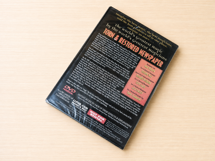 Torn And Restored Newspaper